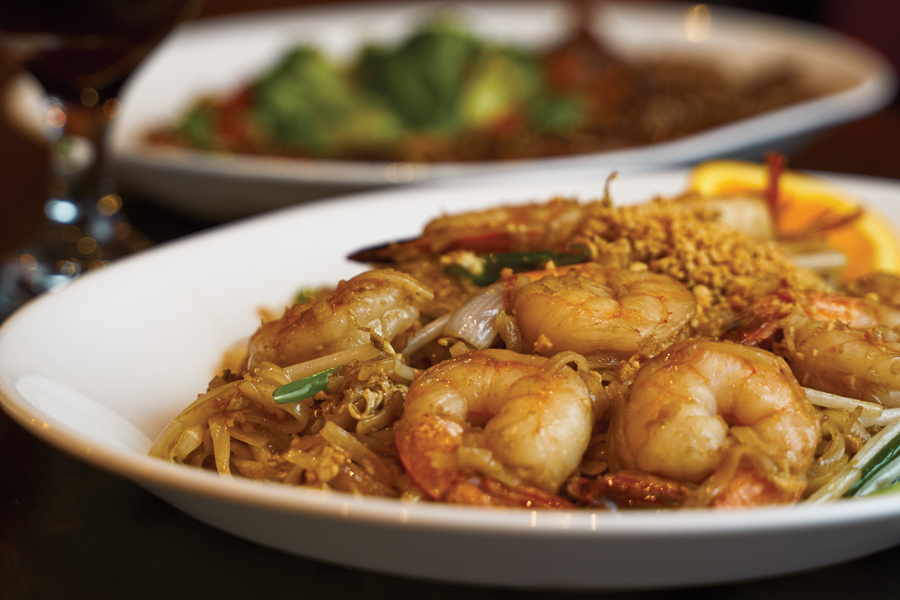 Enjoy a homemade classic with Siam Gulf’s Shrimp Pad Thai, paired with Thai Tea. Photo by Wyatt Kostygan.