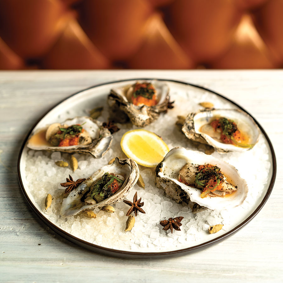 Seabar’s baked oysters add complexity and intrigue to a simple delight. Photography by Wyatt Kostygan
