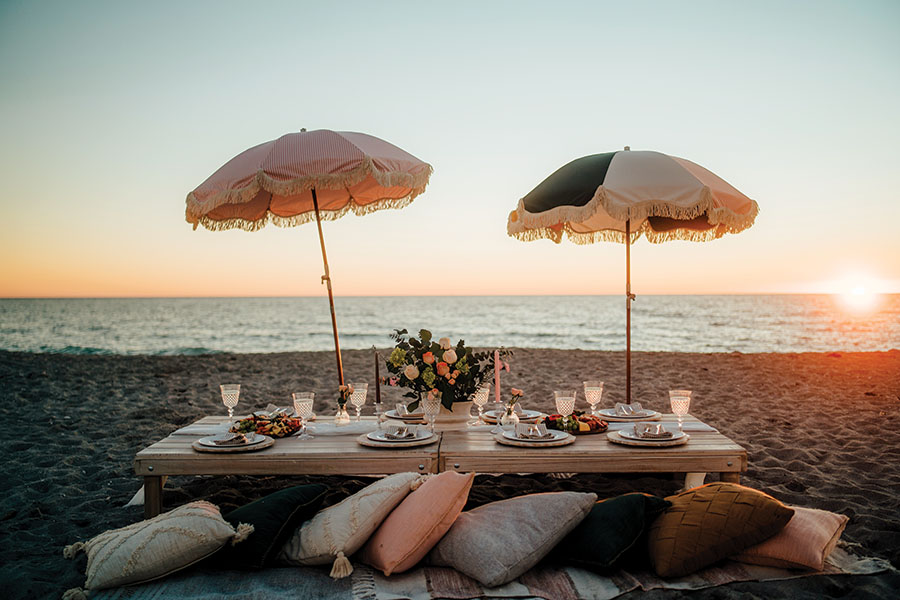 Wooden grazing boards from Charcuterie & Cheese and Australian beach umbrellas from Business and Pleasure Co. Photography by Wyatt Kostygan.