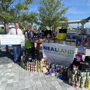 Neal Land & Neighborhoods Supports June Hunger Awareness Month with Donation for Meals on Wheels PLUS of Manatee