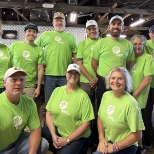 FPL Volunteers Team Up with Feeding Little Tummies