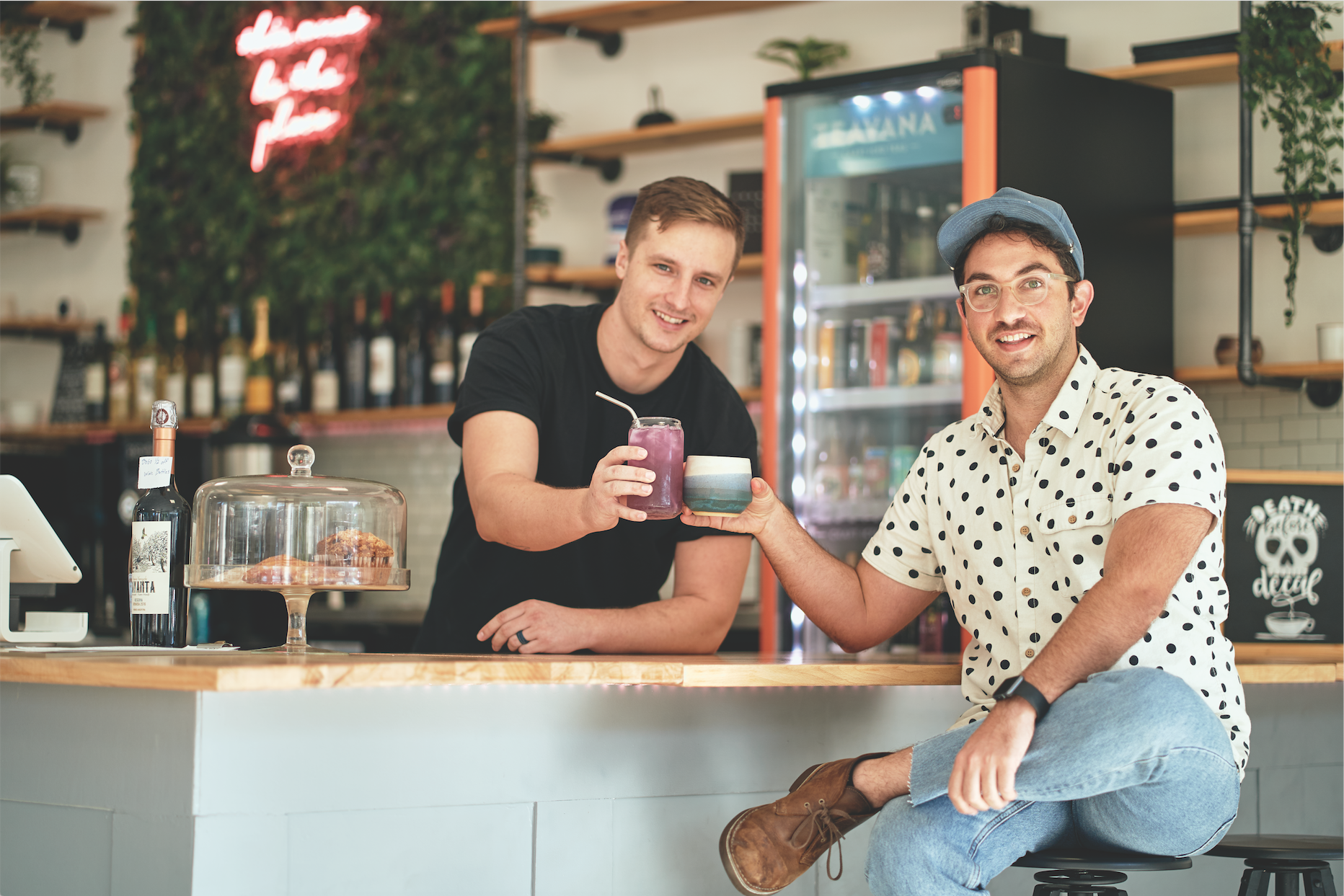 Ben Greene and Keith Nasewicz of Oscura Cafe cheersing to caffeine. Photography by Wyatt Kostygan.