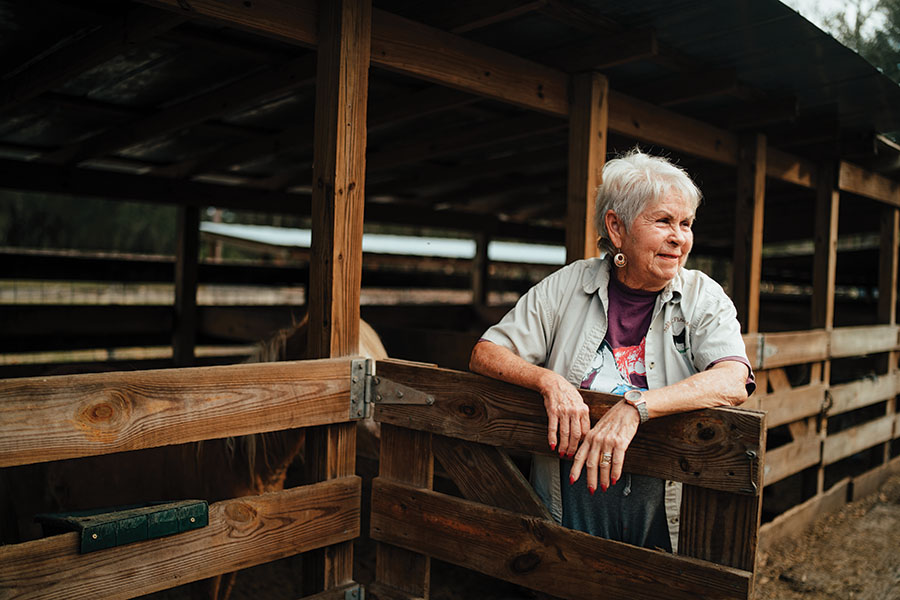  Owner Judy Middleton loves to sit and admire her minis after morning chores are done. Photography by Wyatt Kostygan.