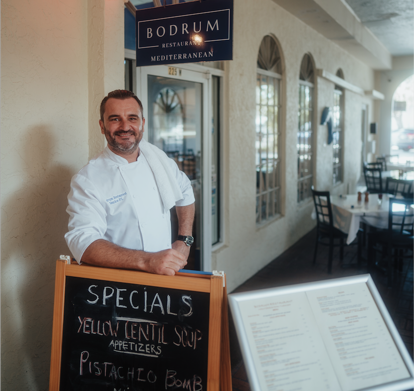 Chef Ersen Irsel stands in the breezeway dining area of his restaurant Bodrum, 225 Maimia Ave. W., Venice, 941-412-0090, bodrumfl.com