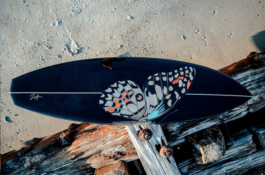 Showing off the board's lively colors and imperfect textures at the pier