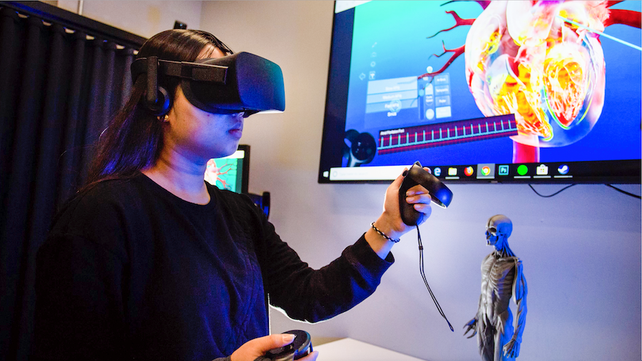Student tests out the virtual reality design and system in Ringling College's VR lab.