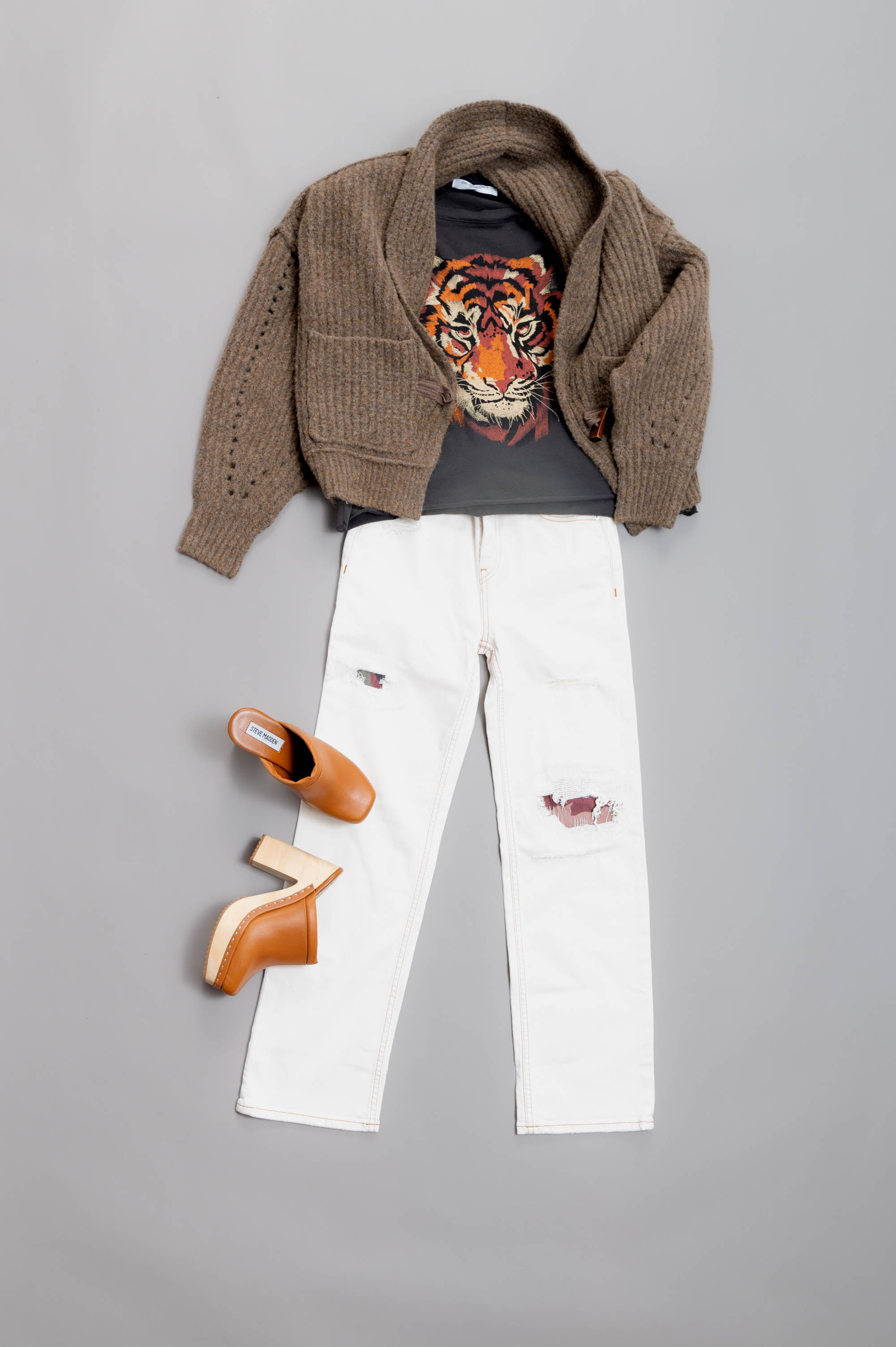 Hudson Remi High-Rise Straight Ankle Jean, $245; Project Social T Los Angeles, Shoulder Pad Muscle Tank in Washed Black, $6; Free People Pinecone Sweater, $178; Alvara Cognac Leather Clog by Steve Mad