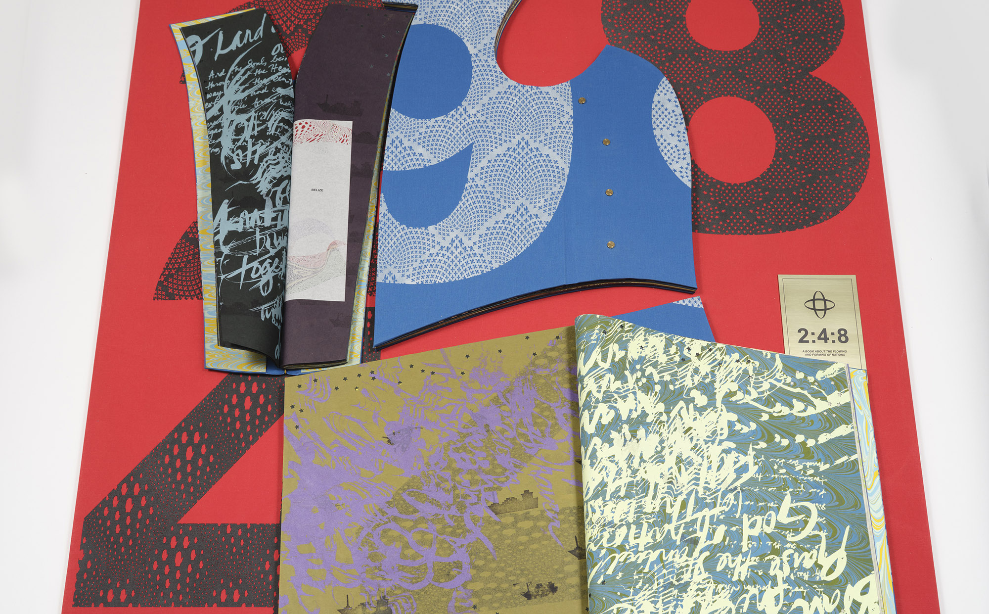 Tammy Nguyen (American, born 1984). 2:4:8, A book about the forming and flowing of nations, 2024. Bookcloth, millboard, various colors of mulberry paper, onion skin paper, 27 lb. Hahnemühle Ingres Pa